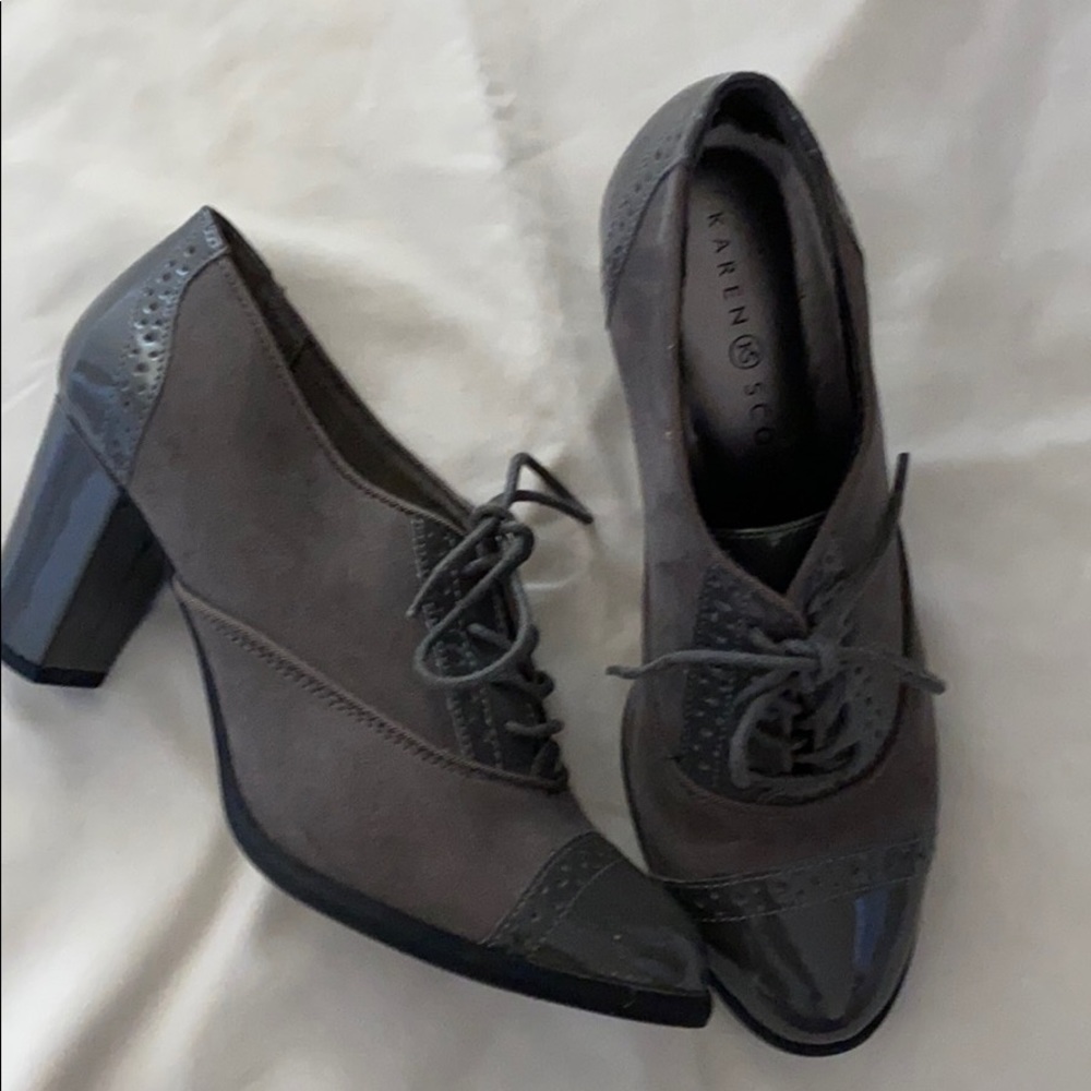 Gray patent and faux suede lace up shoes.